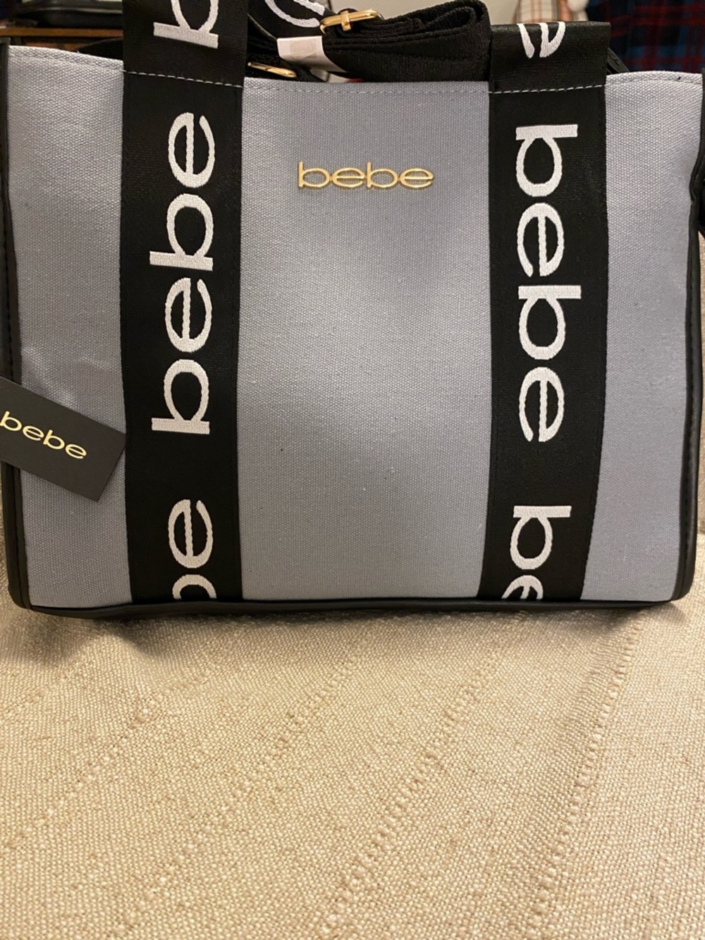 bebe Light Gray Tote with Black Logo Straps and Gold Accent